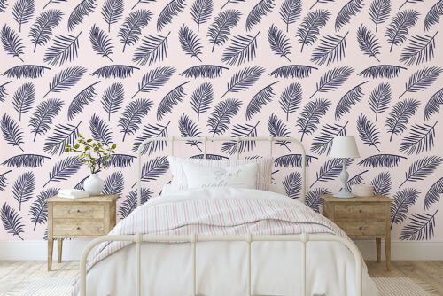 Peel and stick wallpaper with pink background and palm tree leaf pattern
