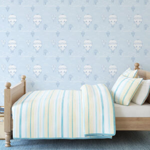 Blue background with white hot air balloon pattern printed on peel and stick wallpaper in Canada