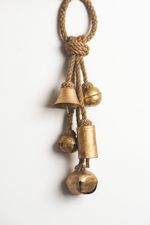 Rustic brass bells on ropee